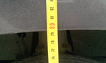mesure de la hauteur prise au niveau du garde boue avant : 79,9 mm