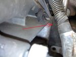 le joint pistolet entre le support de pompe à eau et le bloc