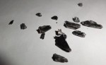 morceaux de métal trouvés dans la boite de transfert.(2° photo)